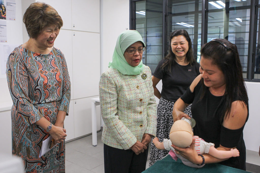 Caritas Singapore Welcomes Mdm Halimah Yacob, President of Singapore, at Agape Village 6 3 Janet Ang Chair Caritas SG Mdm President Esther Chia ED ACMI and Gemma